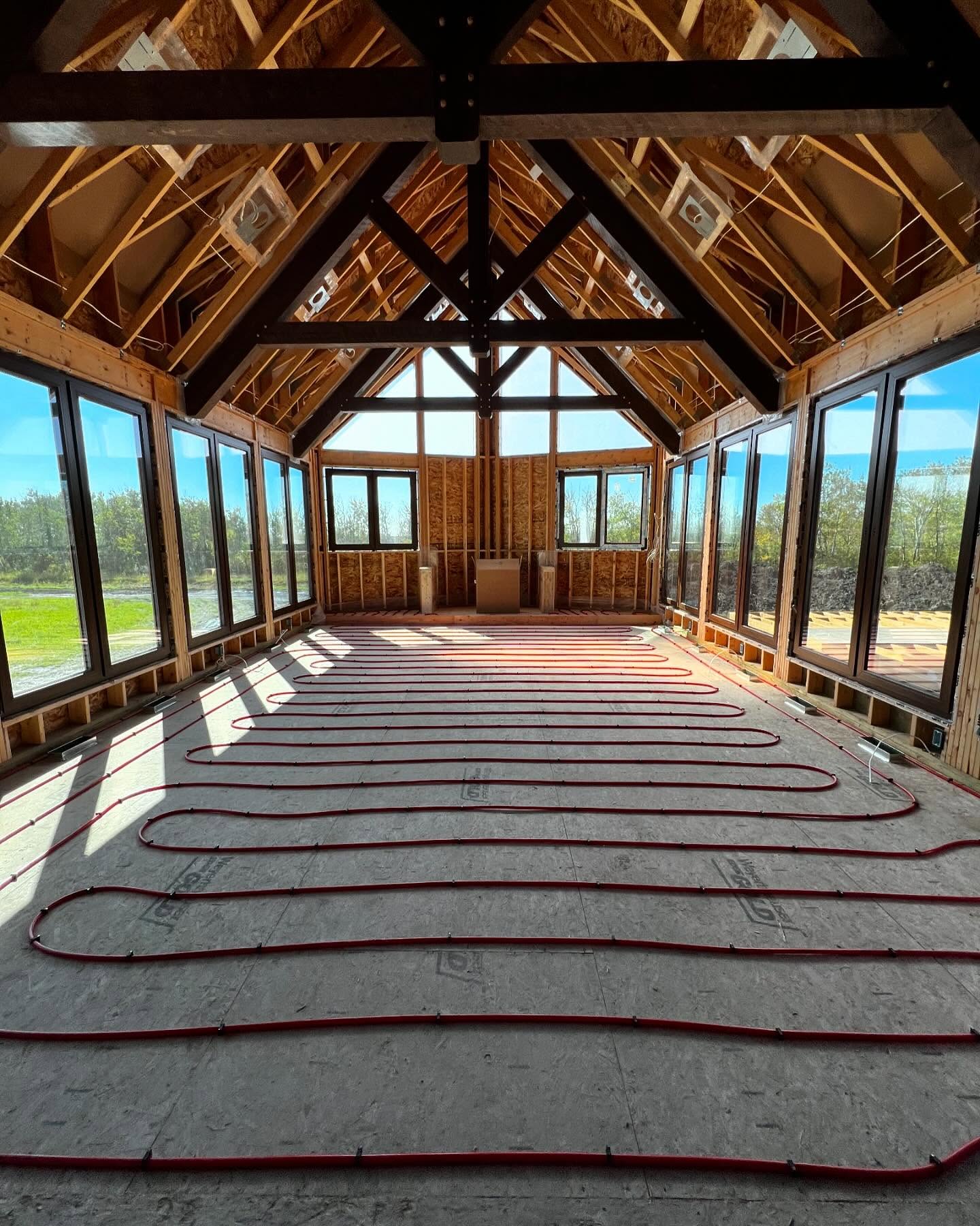 In-floor radiant heating manifold installation